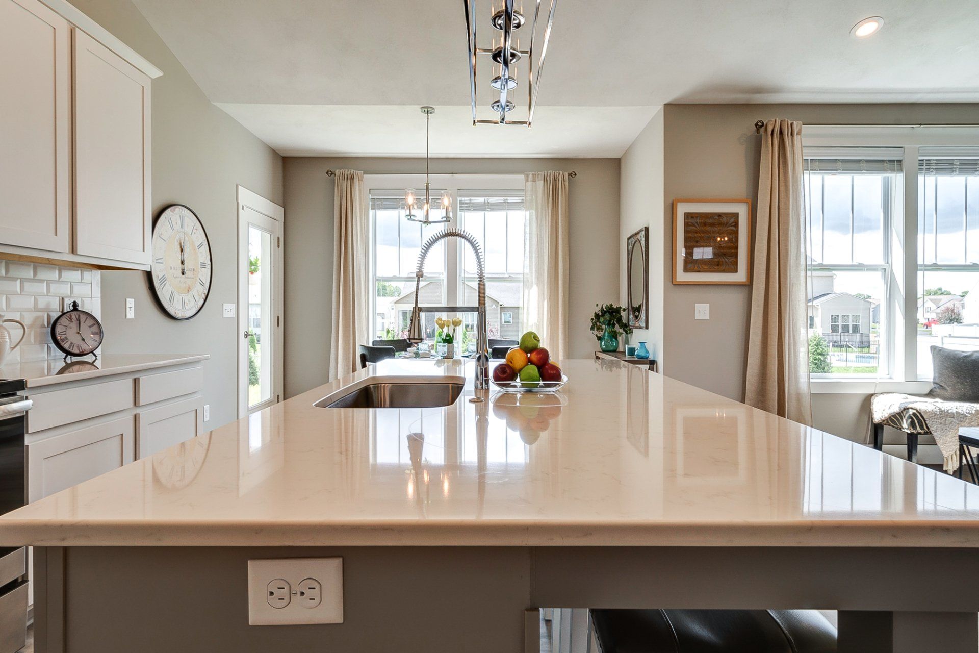 kitchen island with sink and seating