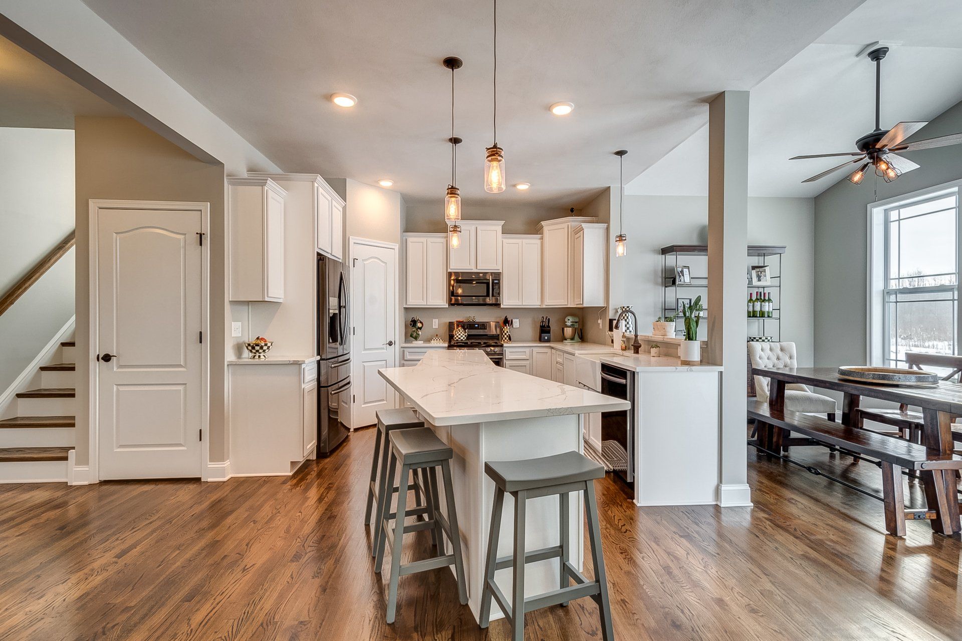 stairs, kitchen, and dining room