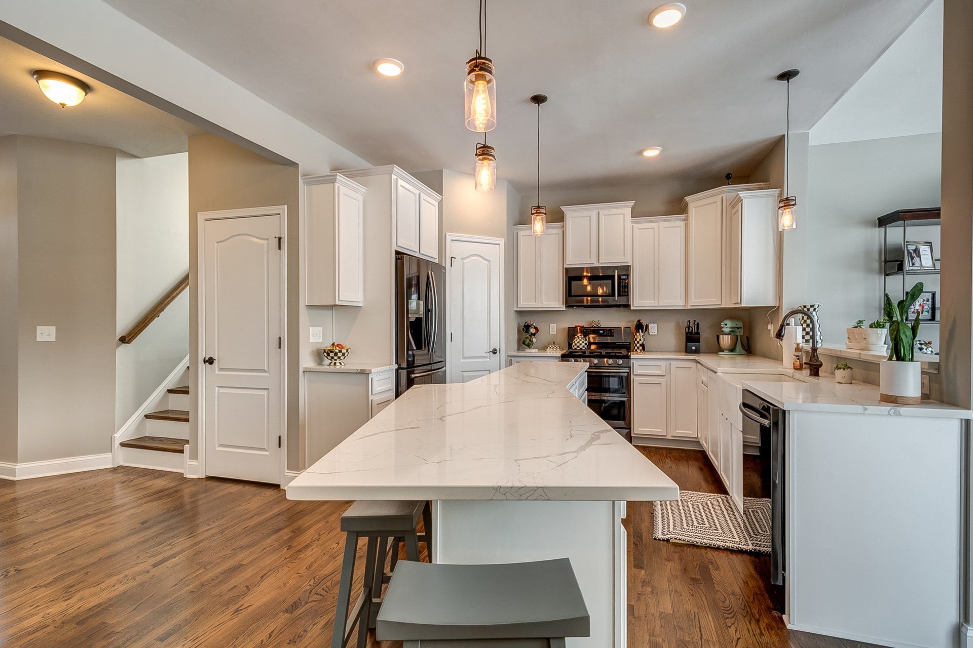 kitchen and staircase in background