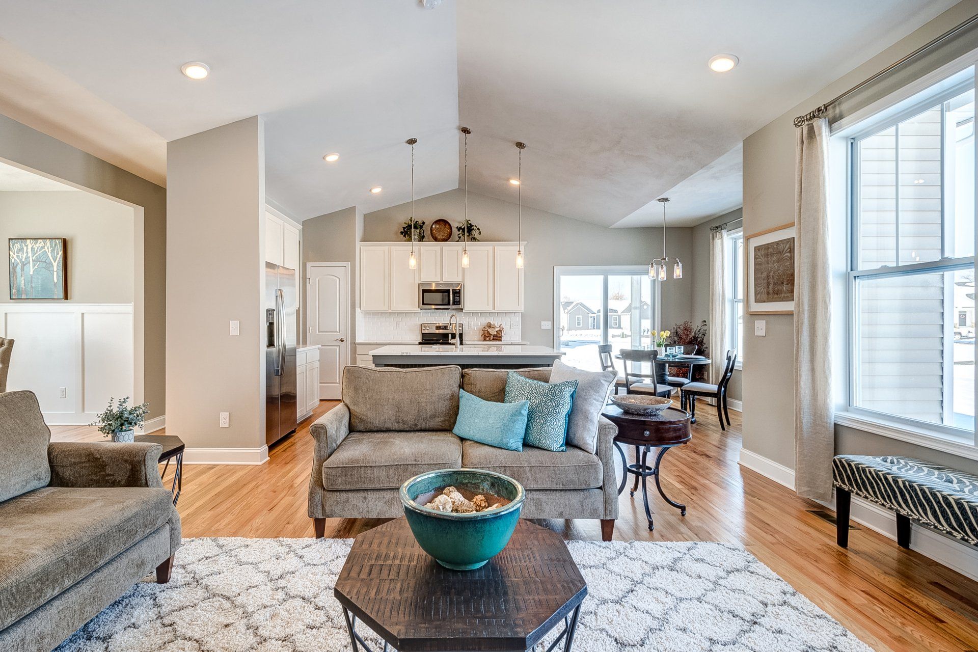living room with kitchen and dinette in background