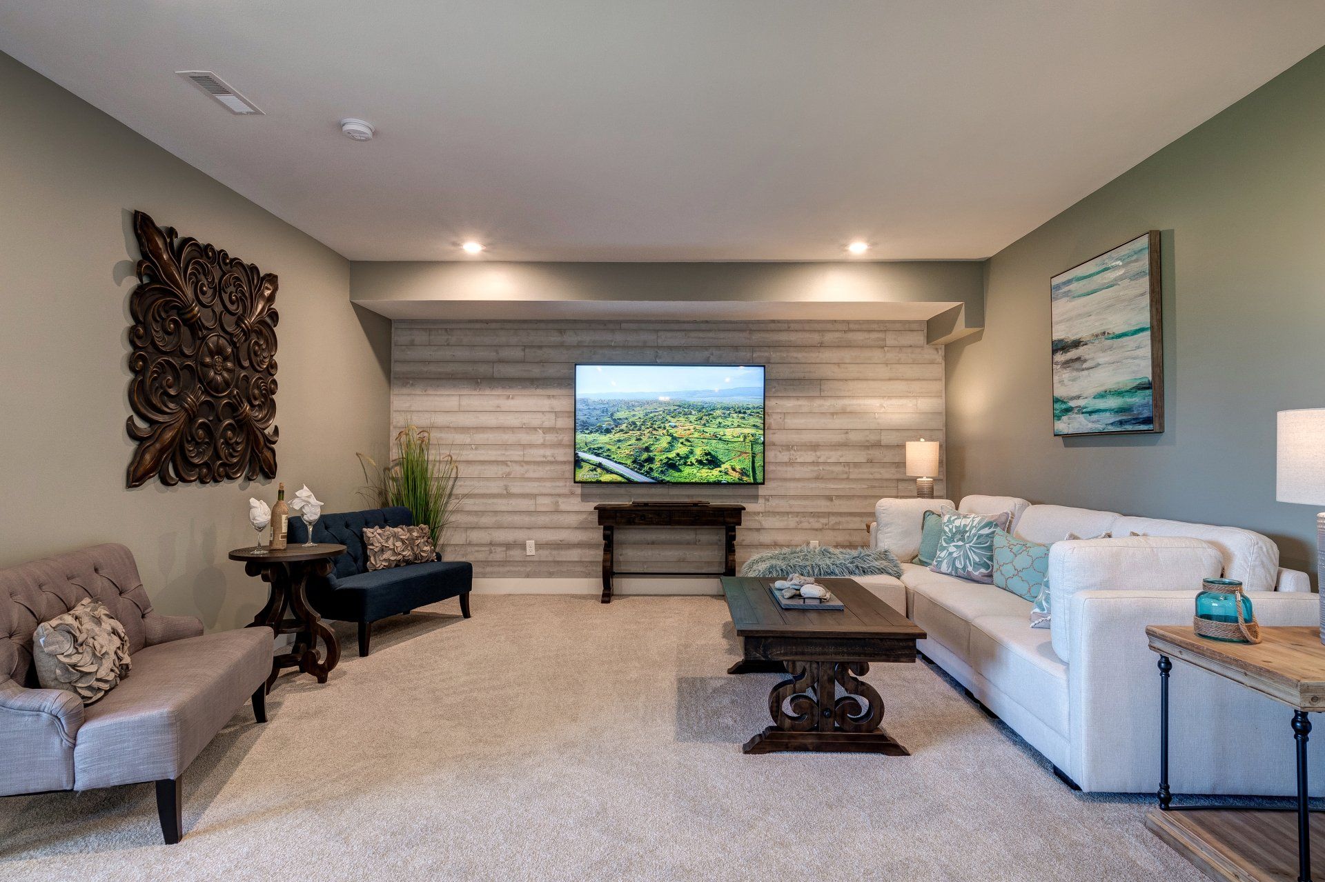 living area with seating, coffee table, and tv