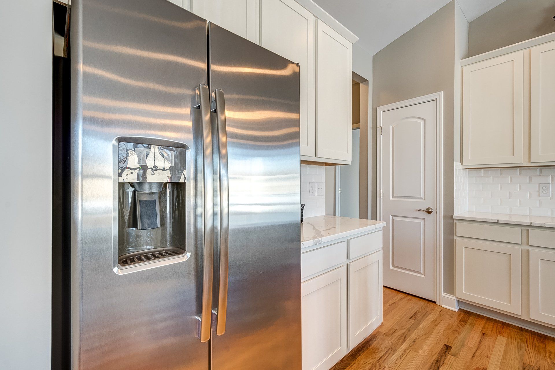 Metallic fridge in a kitchen