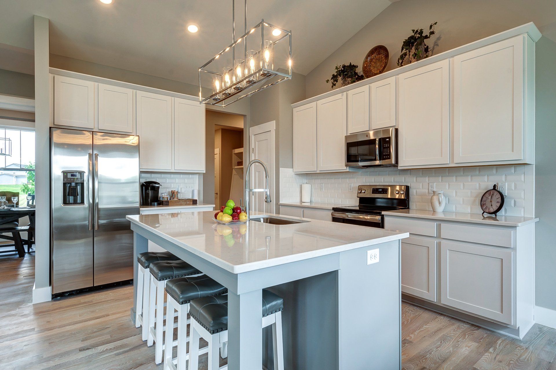 L shaped kitchen with island that has seating