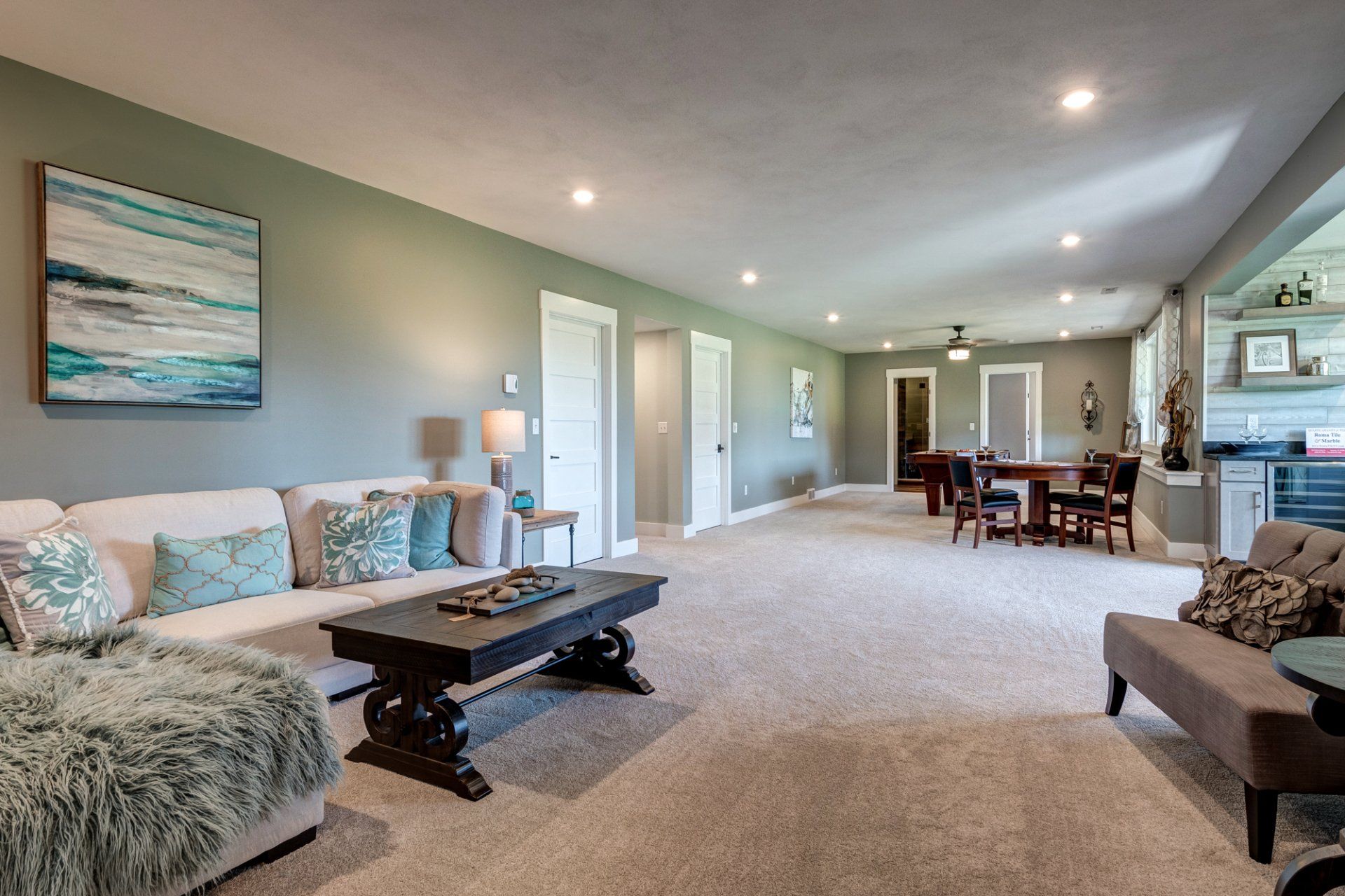 flex with living area and poker table in background