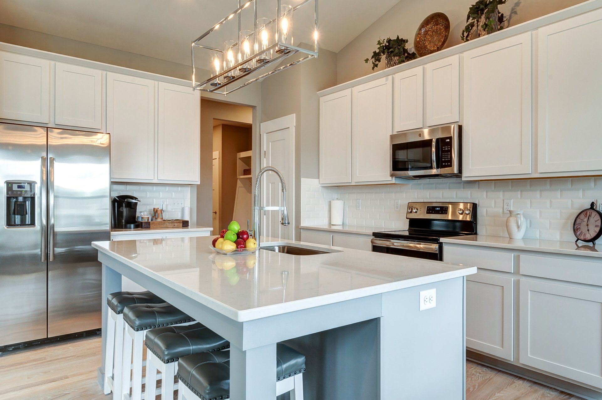 kitchen island with sink and seating