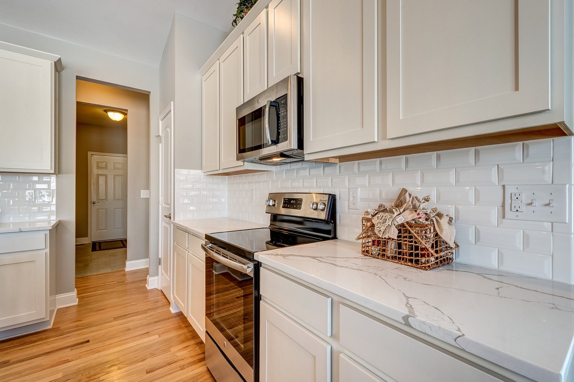 kitchen cabinets around microwave and range