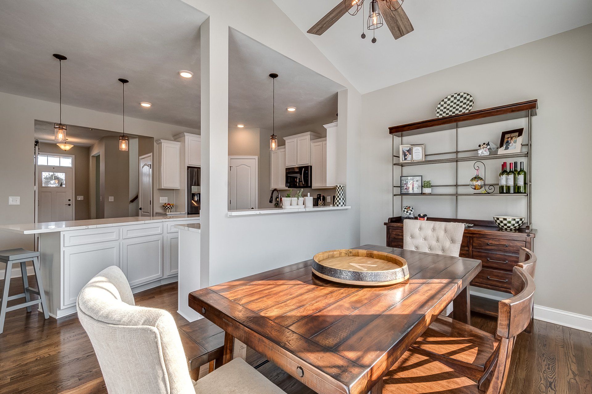 dining room with kitchen in background