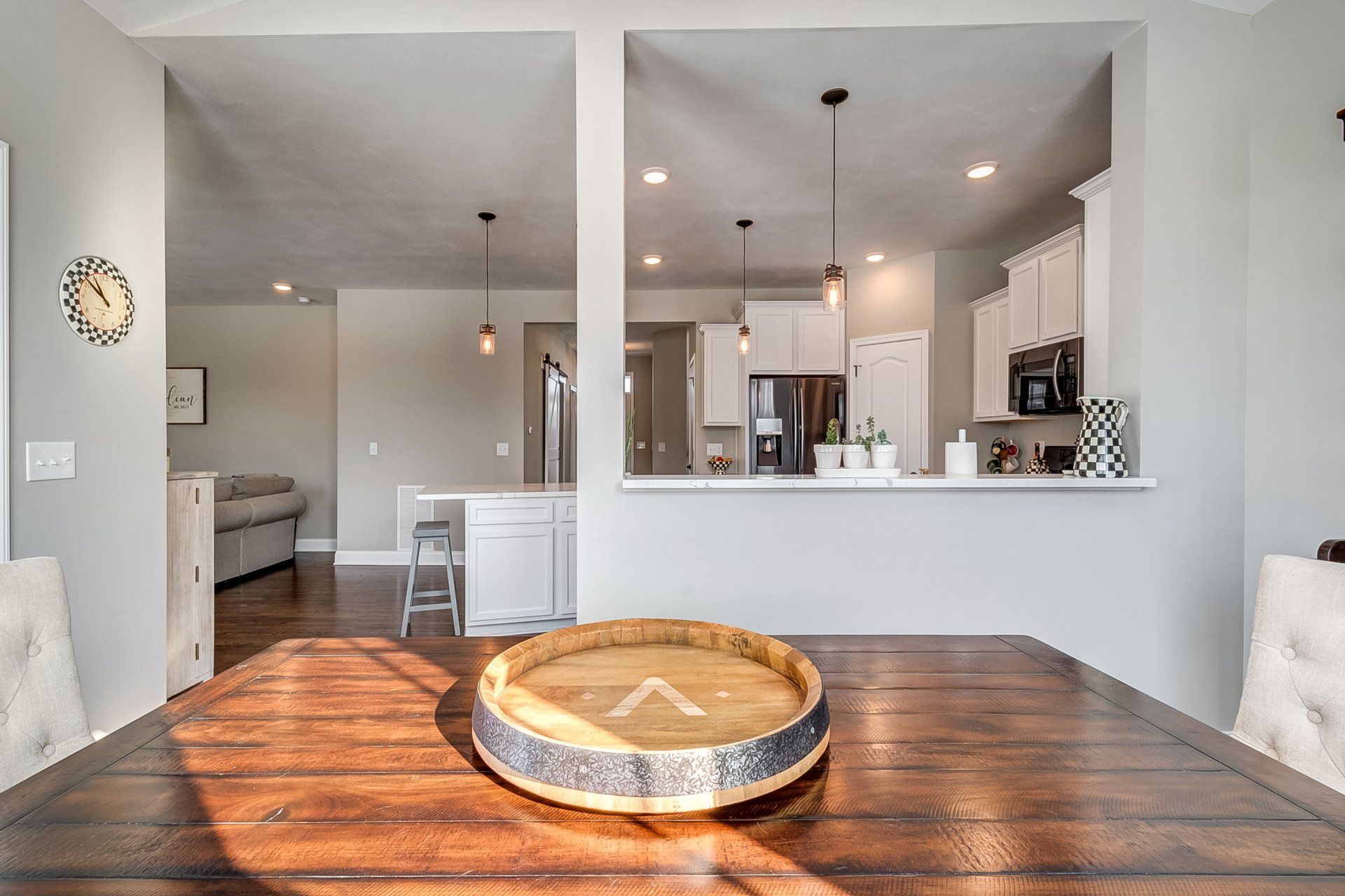 dining room table with kitchen in background