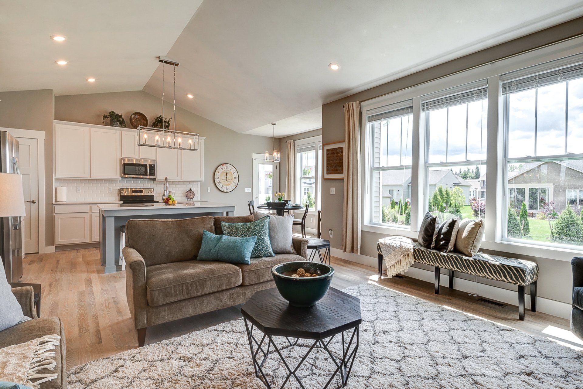 living room with kitchen and dinette in background