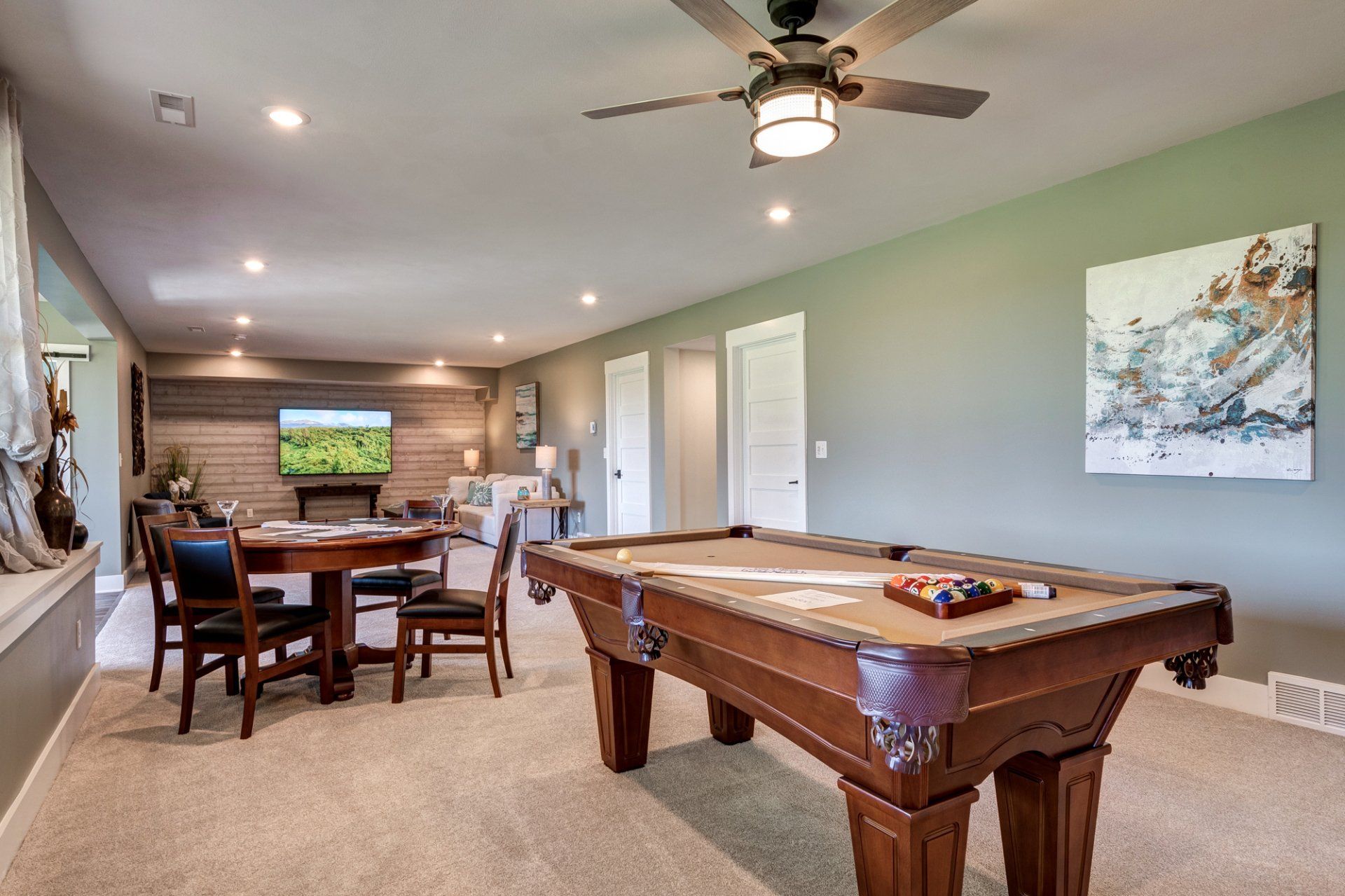 flex room with poker table and pool table