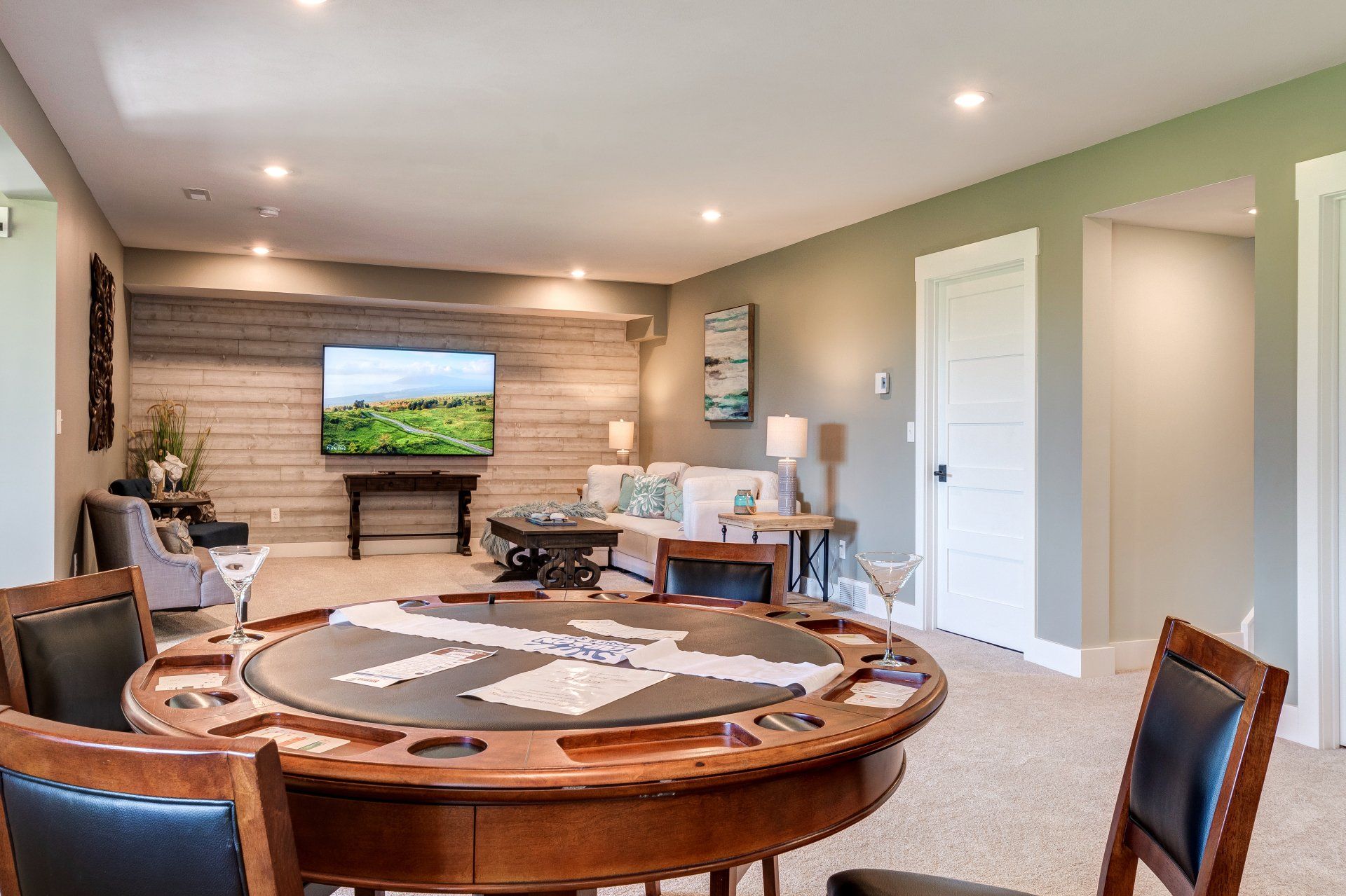 poker table and and living area in flex room