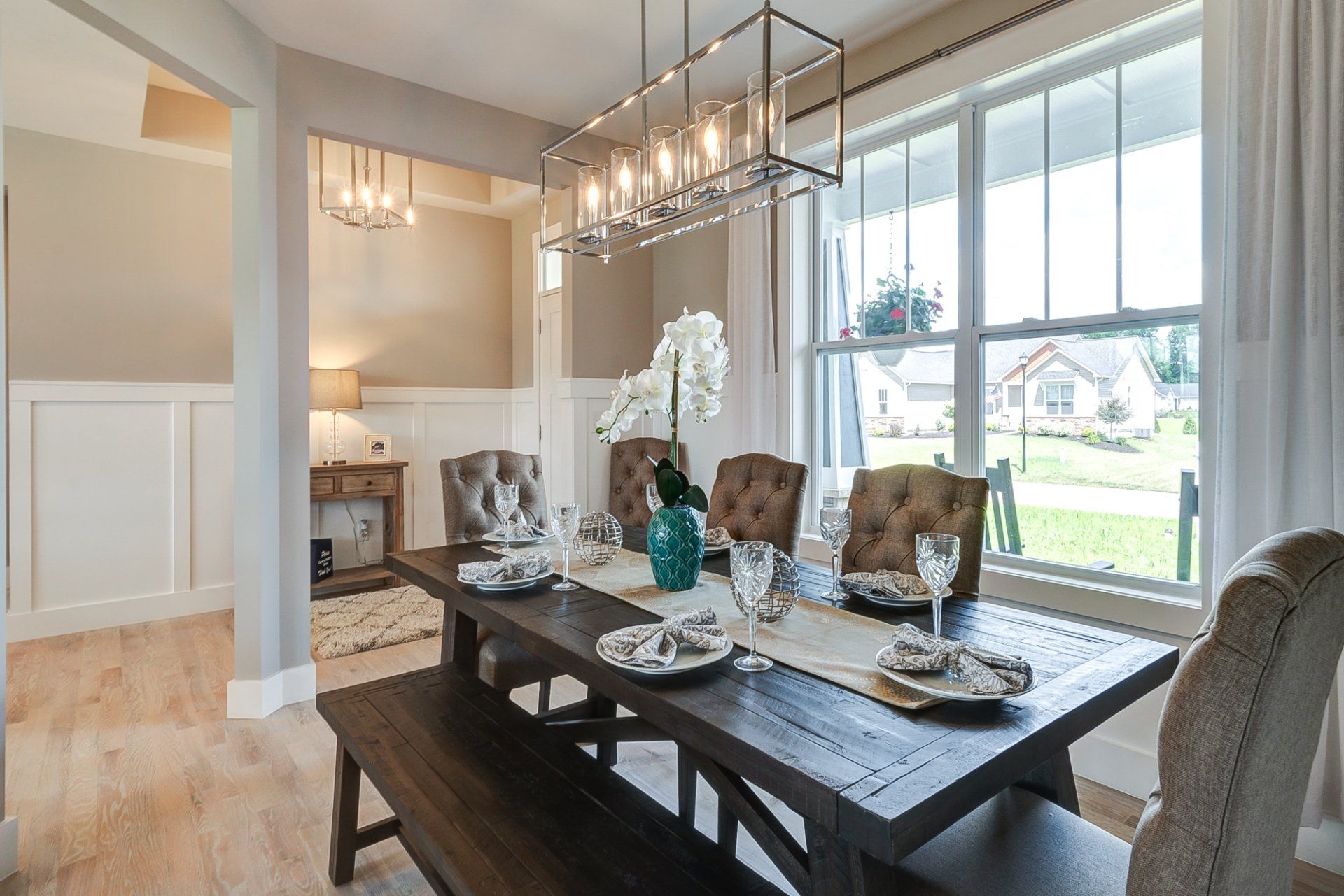 rectangular light fixture above 6 person dining room set