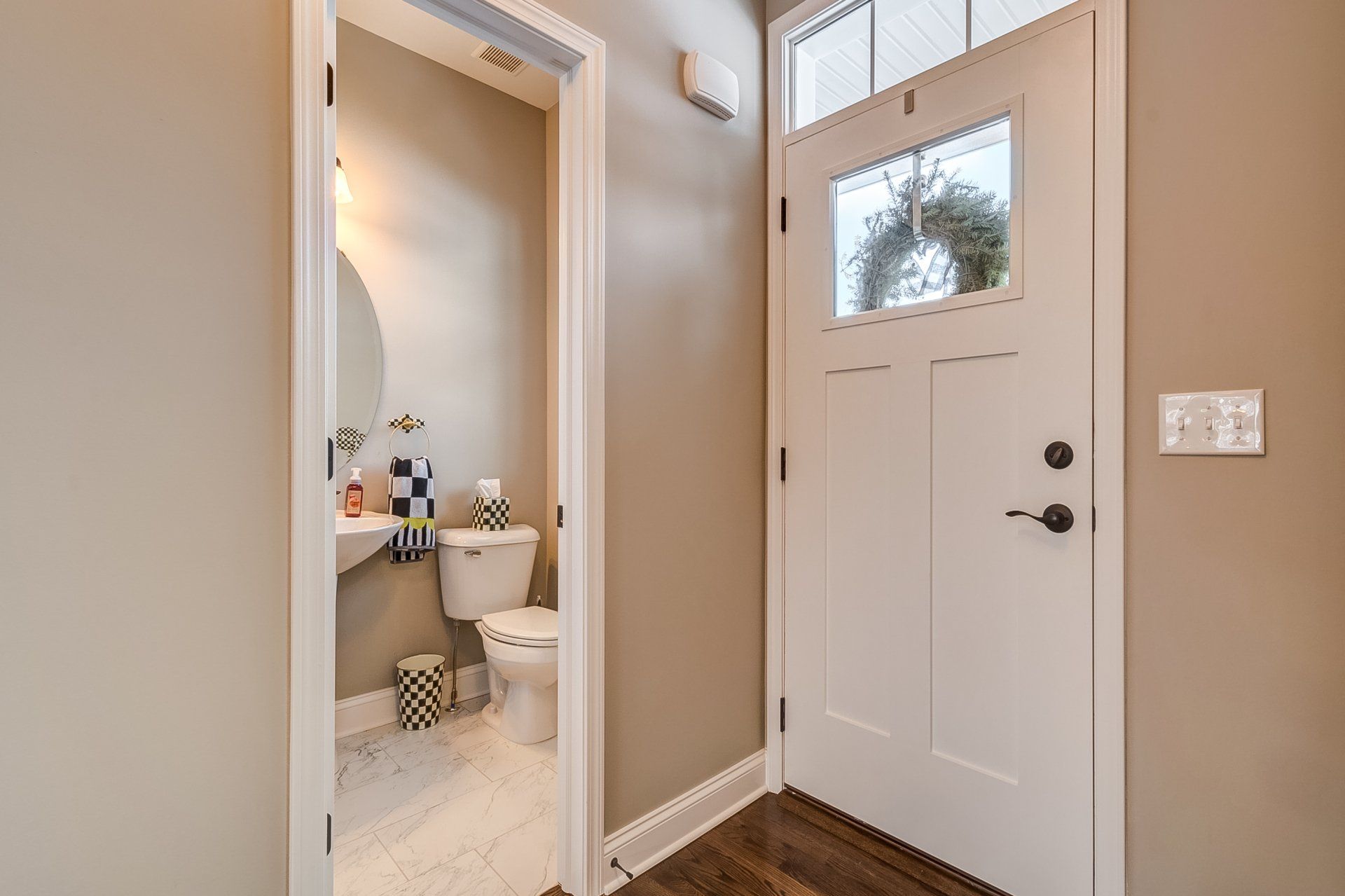 front entryway and half bath