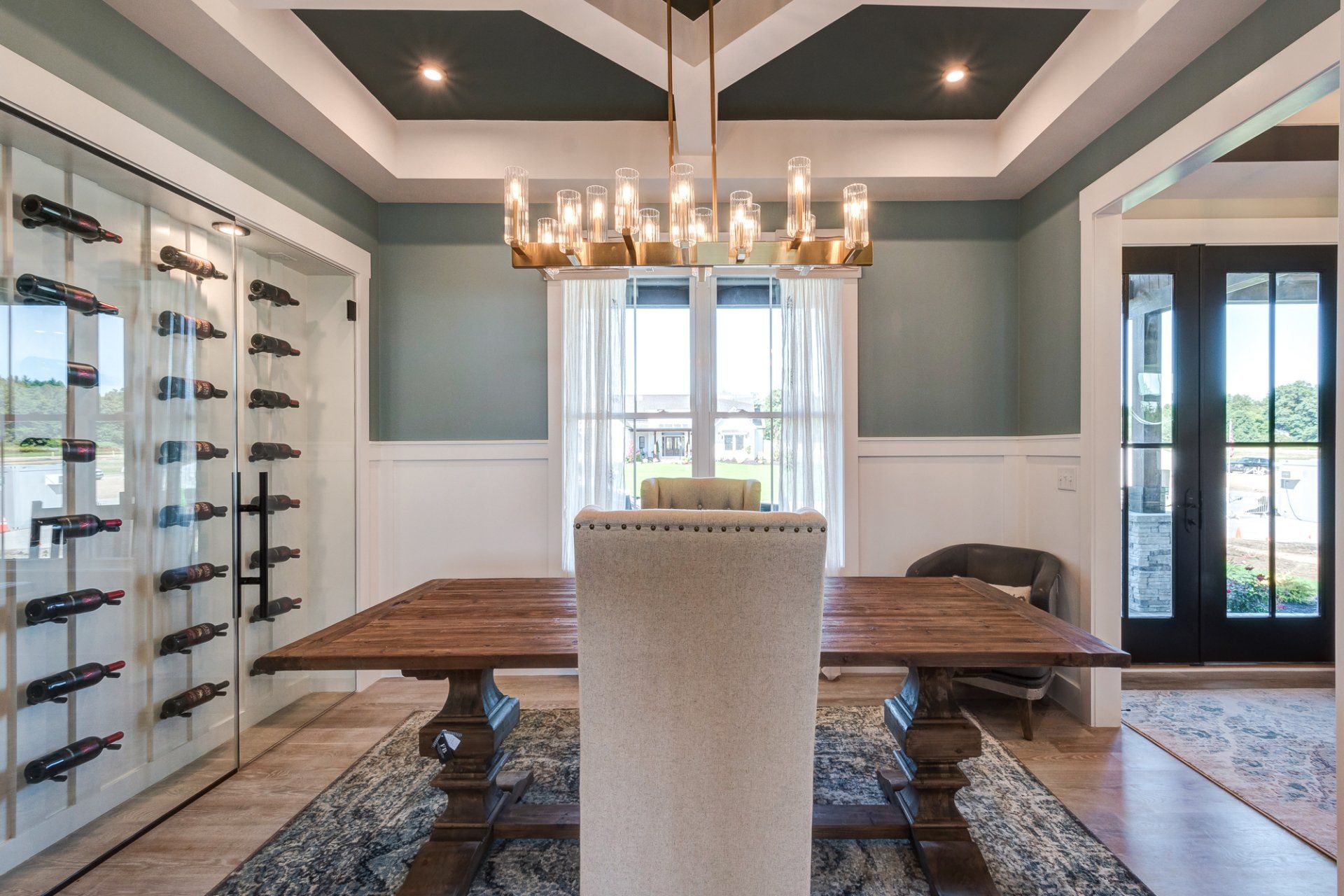 dining room with recessed ceiling