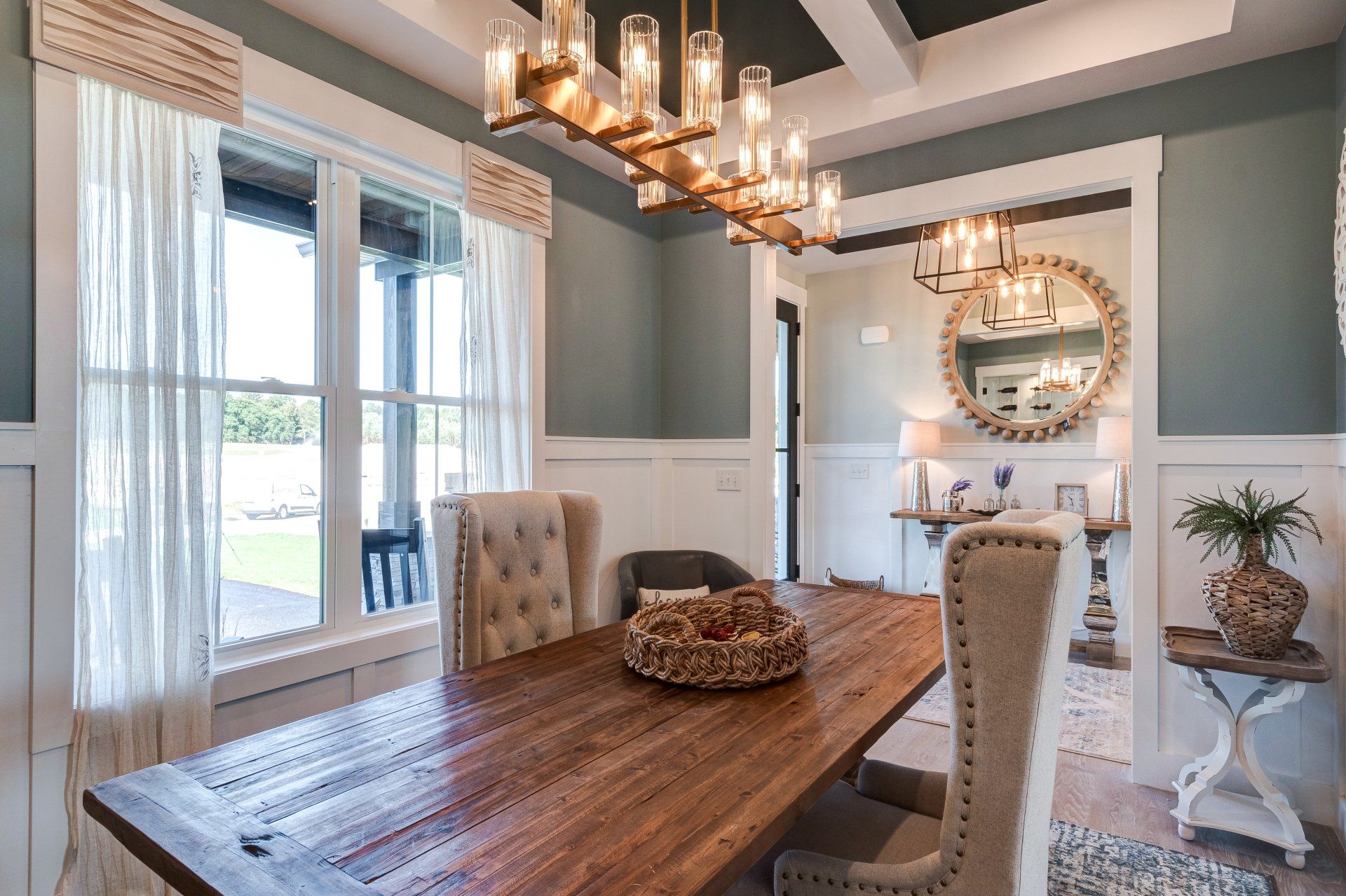 Dining room with wood table and hallway in background