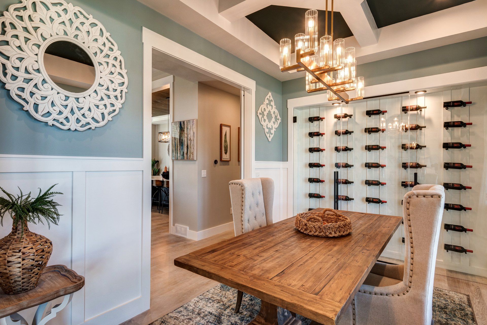 dining room with wood table and wine cellar