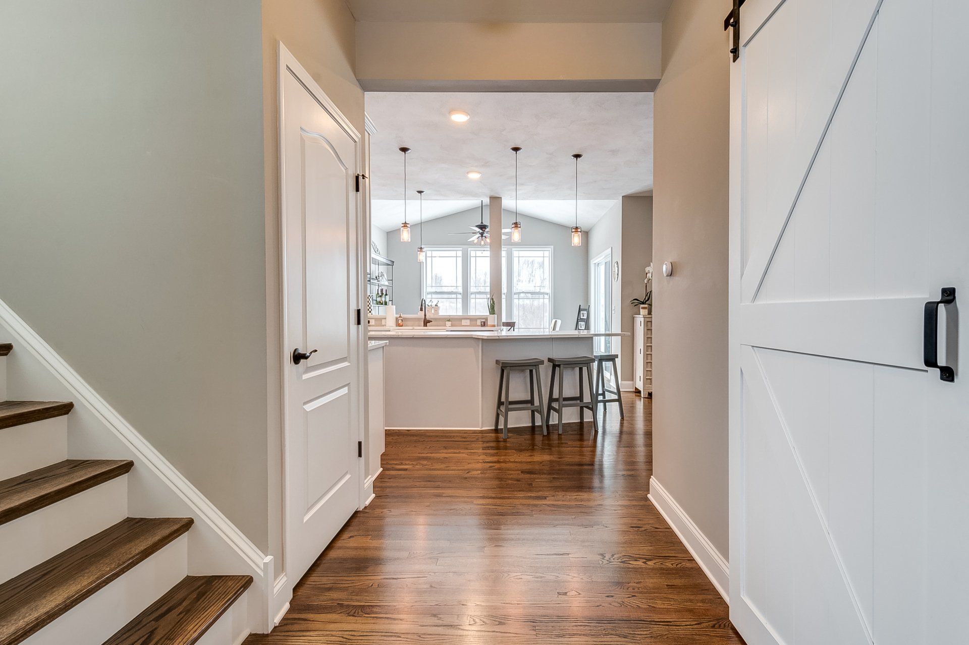 stairs and hallway to kitchen