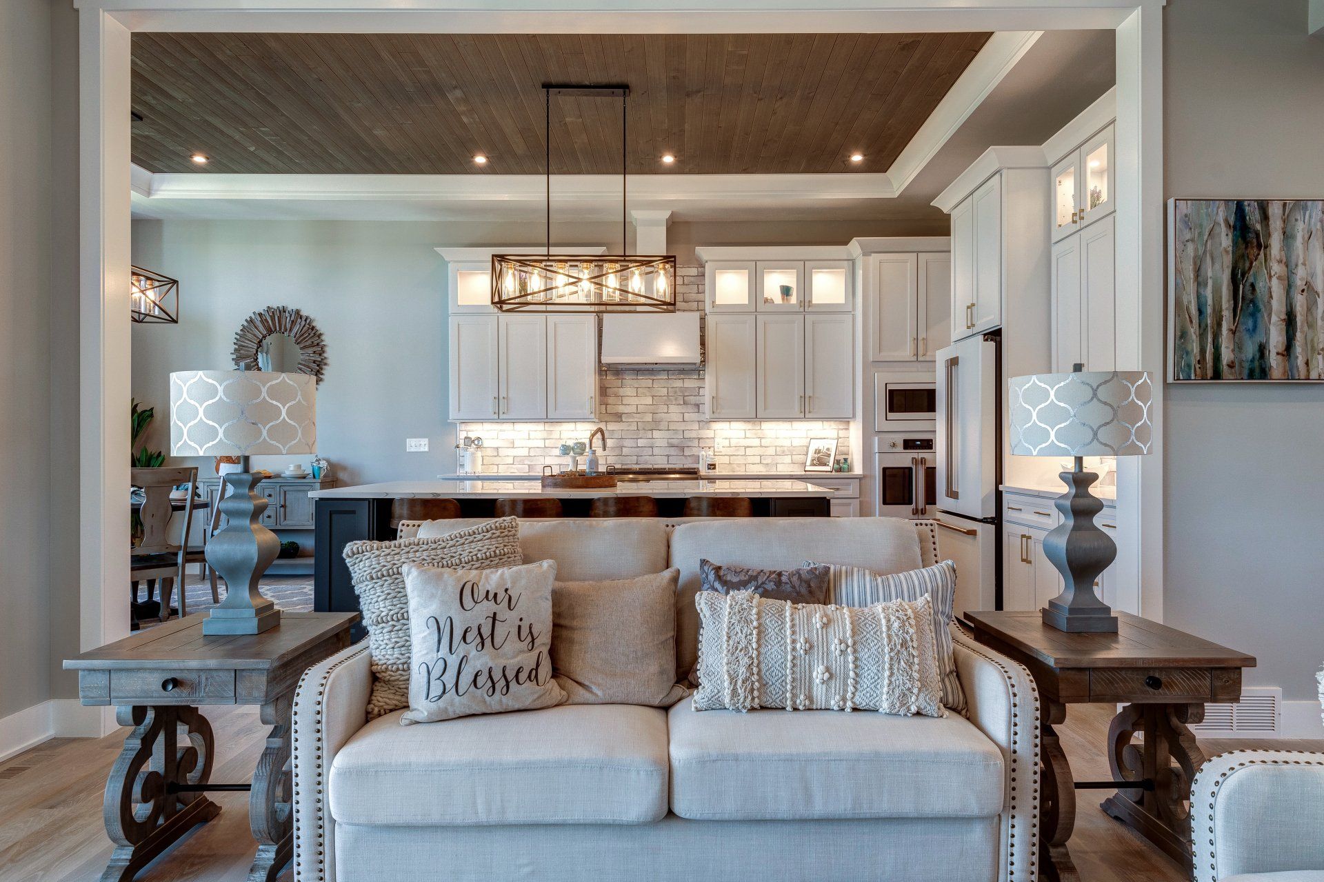 love seat with kitchen in background