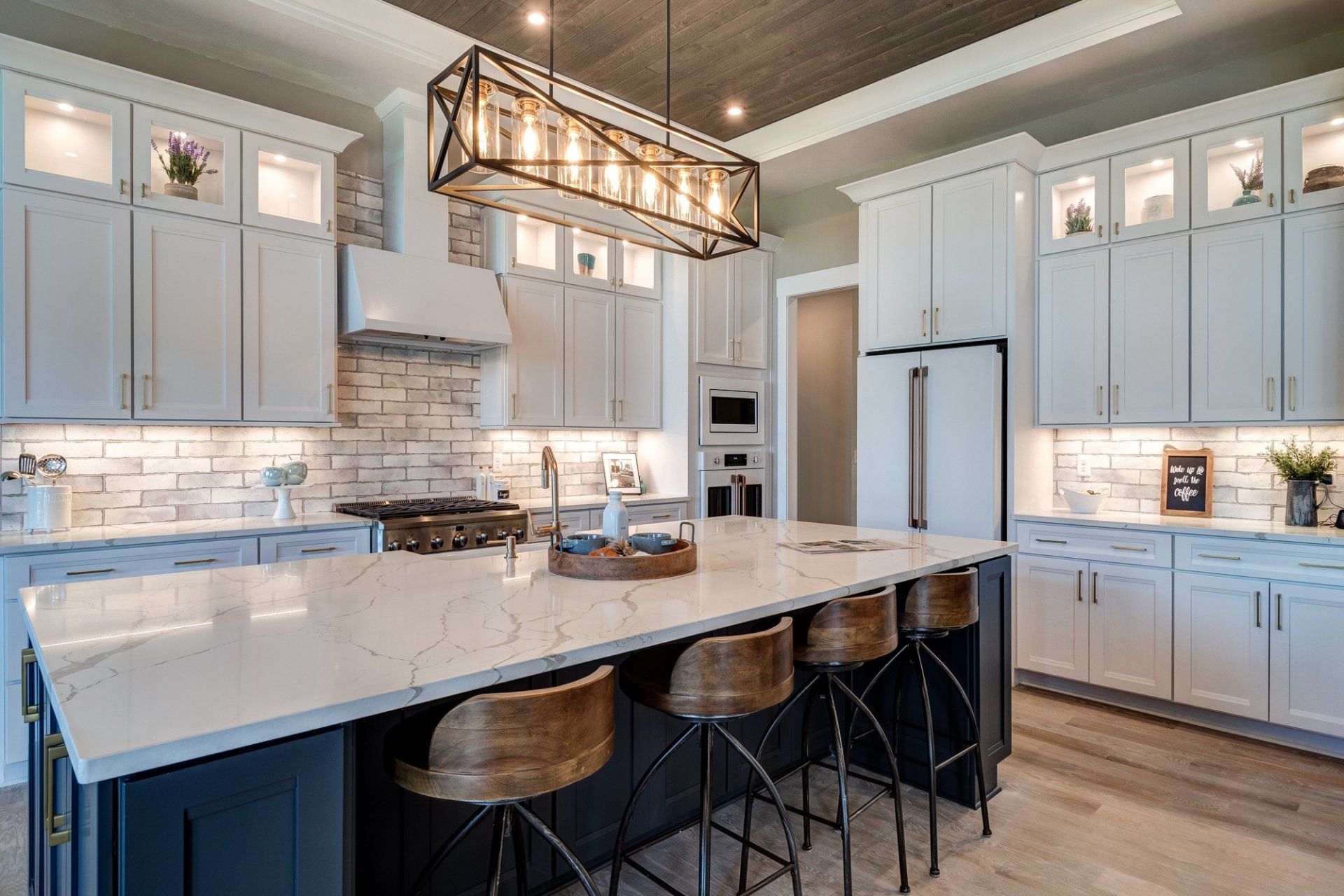 kitchen with island seating and white appliances