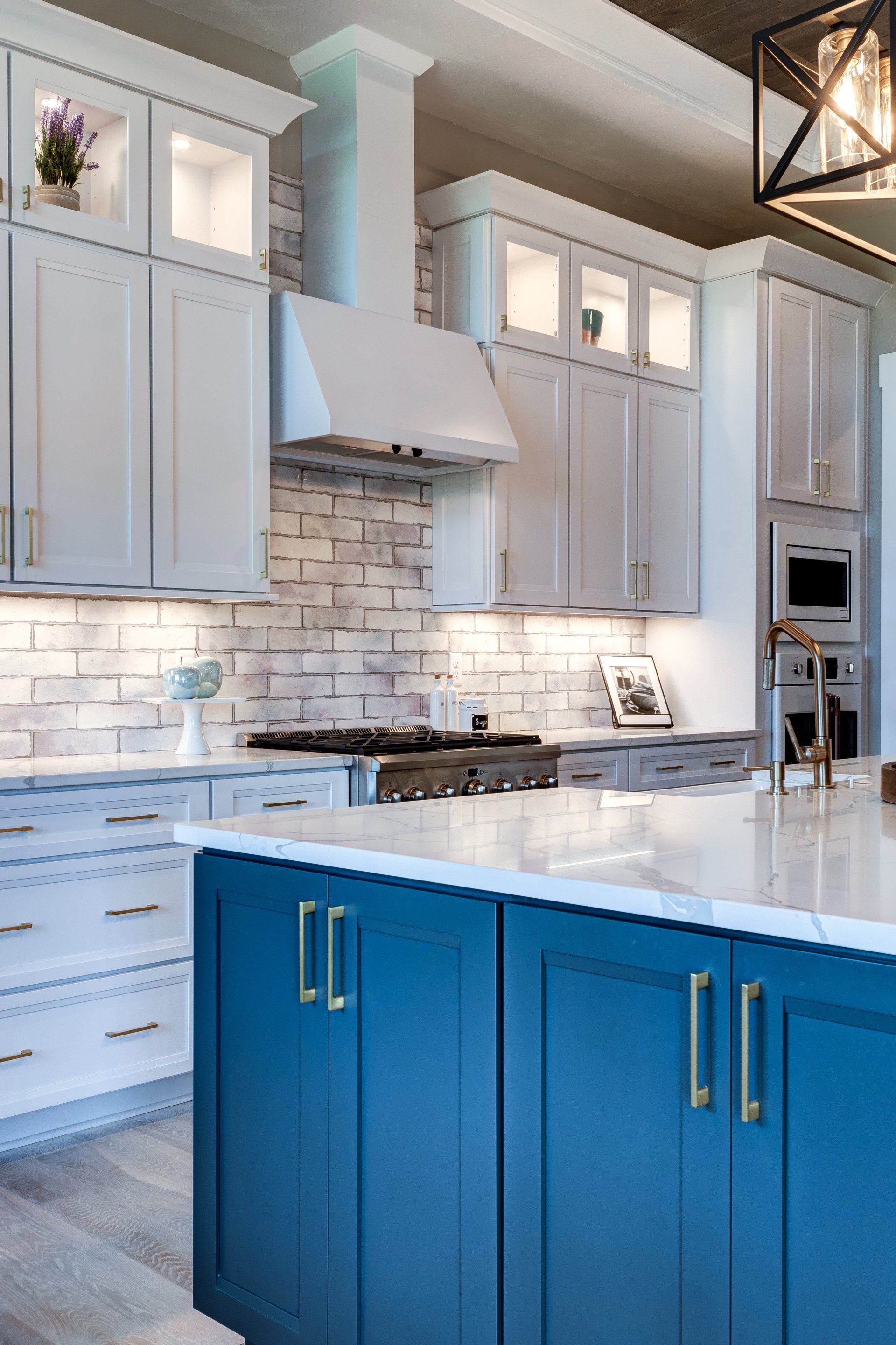 cabinets, range hood, and range
