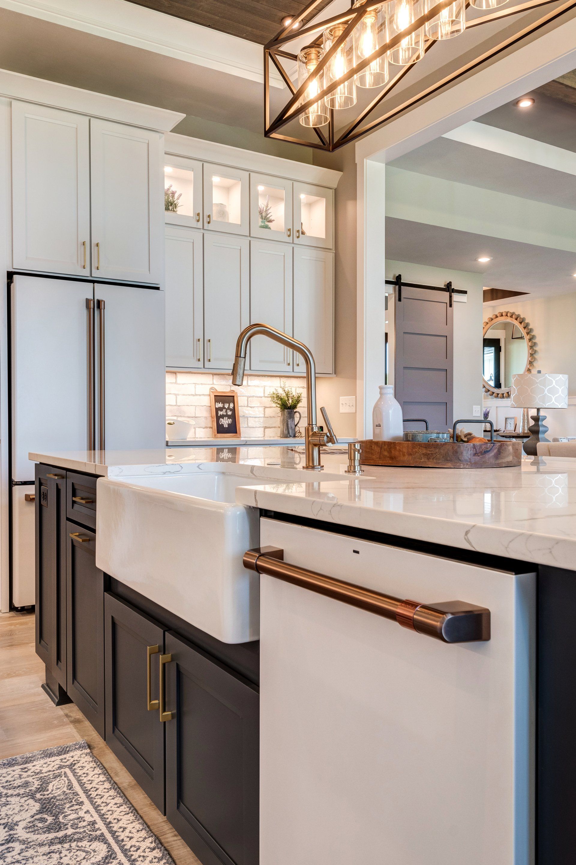 kitchen island with sink and dishwasher underneath