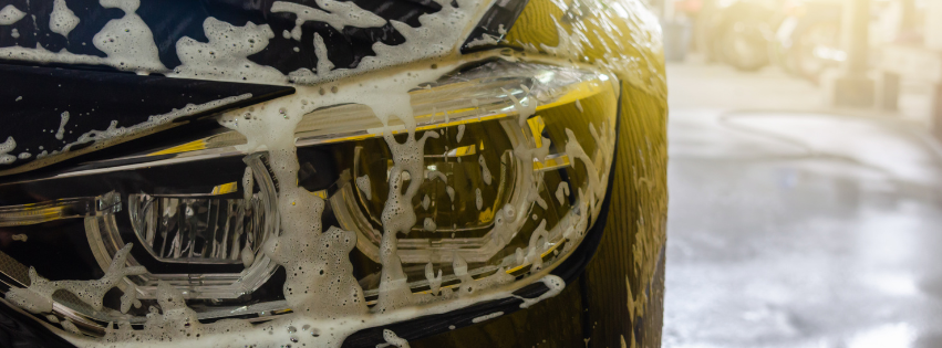 black car being soaped 