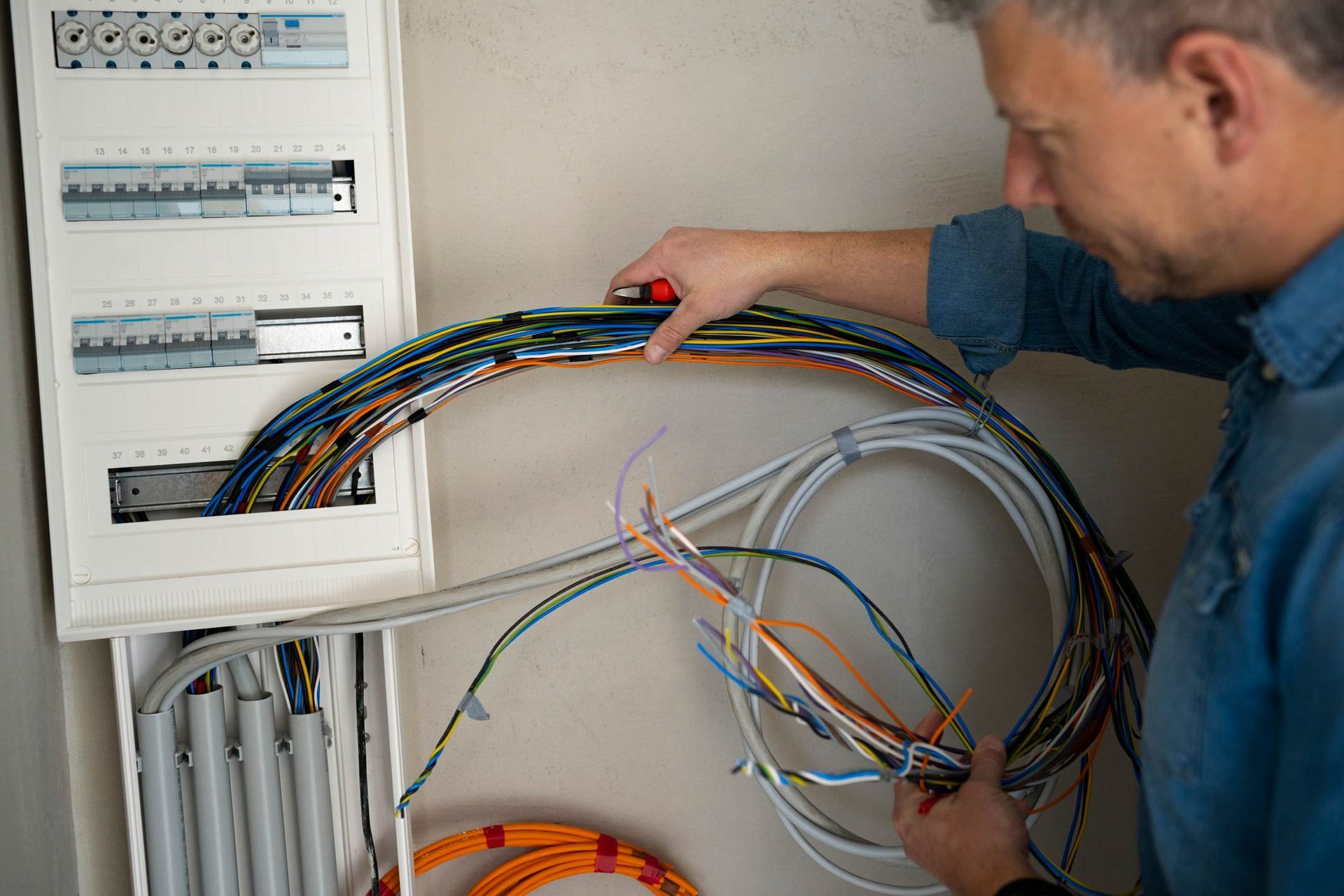 Male electrician with blue jeans shirt | Darling Downs, QLD | Jasmak Electrical Specialists