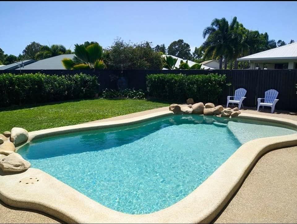 Curved Backyard Pool — Gulliver, QLD — Concrete Pool Repairs