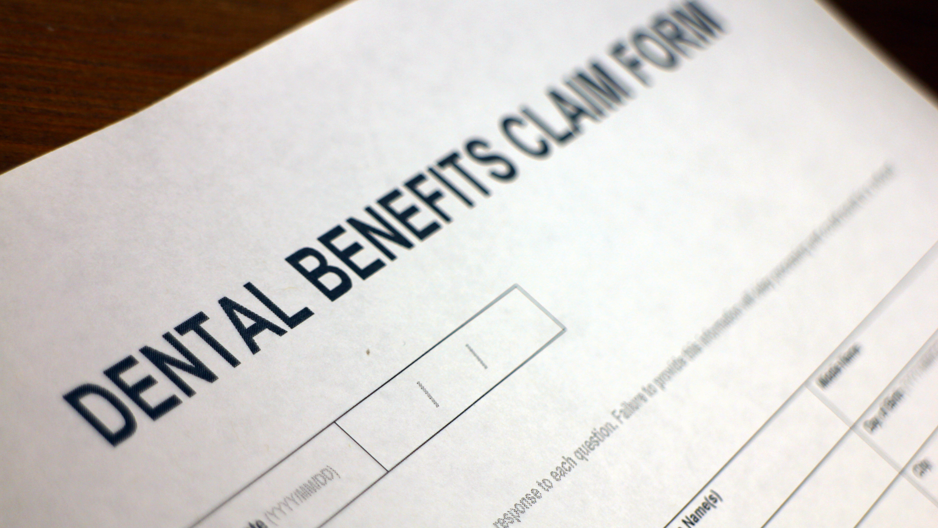 a close up of a dental benefits claim form
