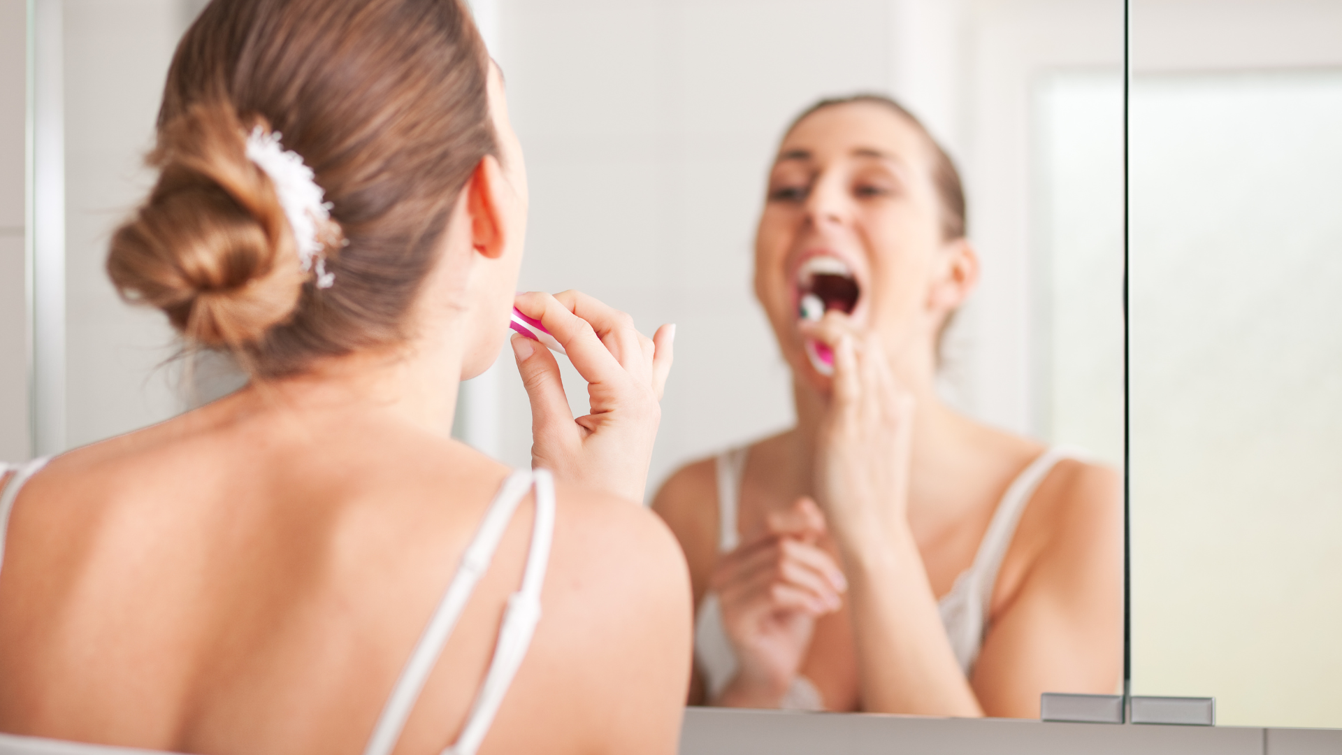 Man and woman brushing teeth prevent dental staining