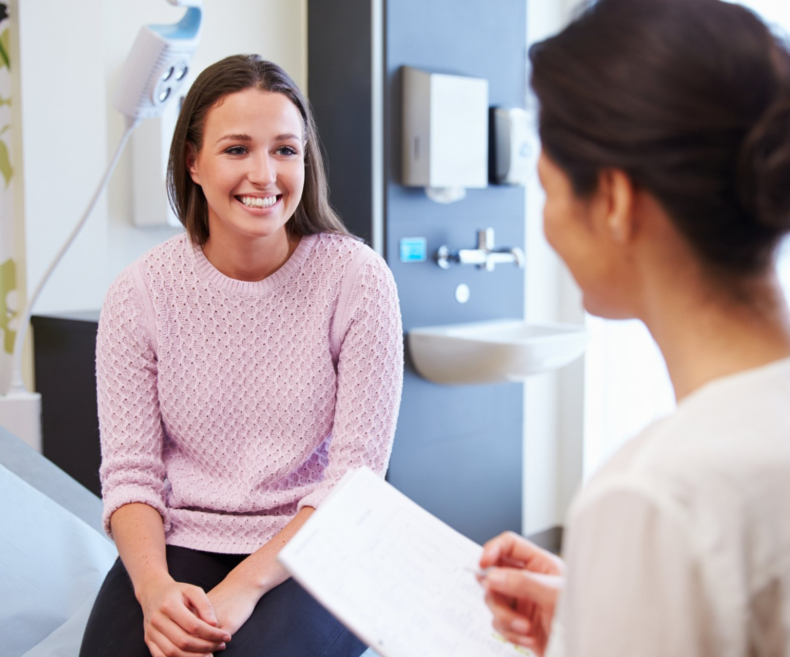 young woman during doctor exam