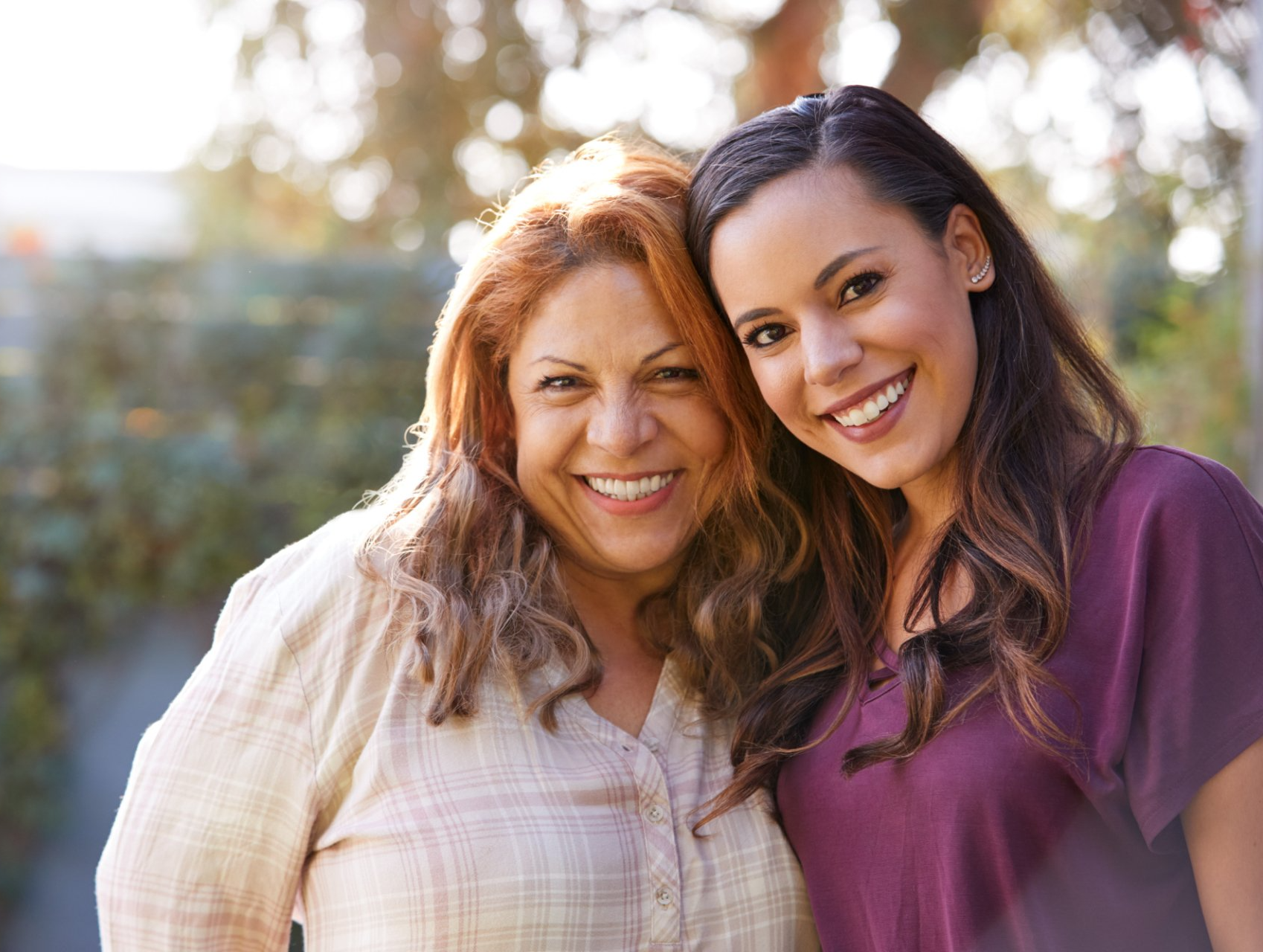 senior latina mother and her 30-year old daughter