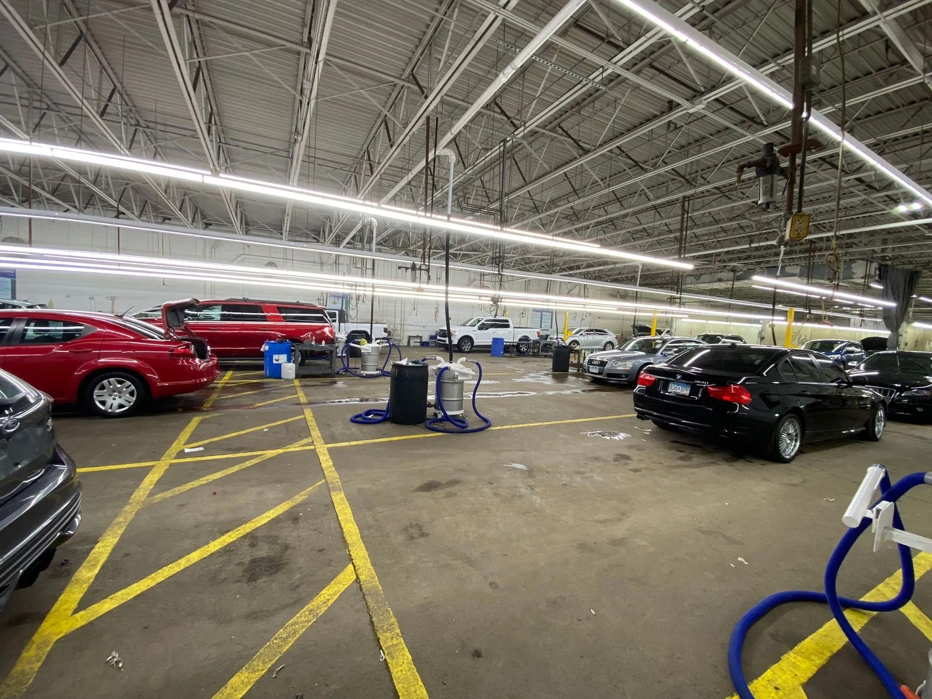 A lot of cars are parked in a parking lot.