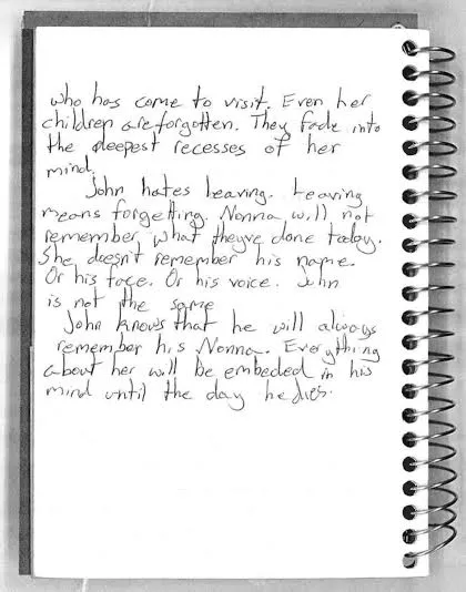 A spiral bound notebook with handwritten notes on it