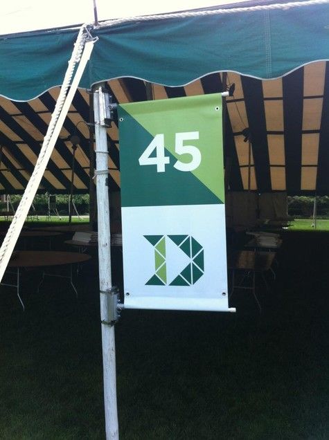 Banner with number 45 and a geometric 