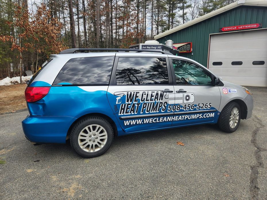 Silver and blue minivan with 