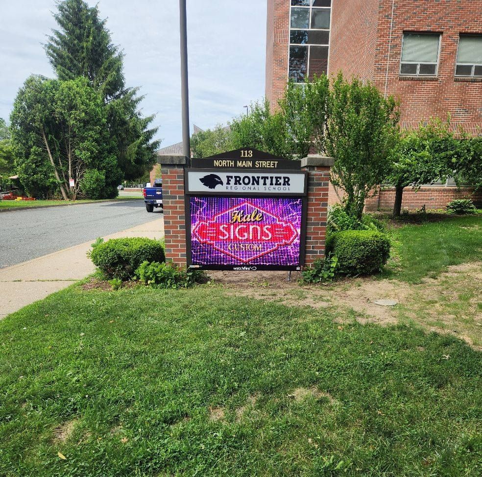 Sign for Frontier Signs, a business.