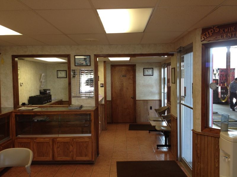 The inside of a restaurant with a sign that says ' ice cream ' on it