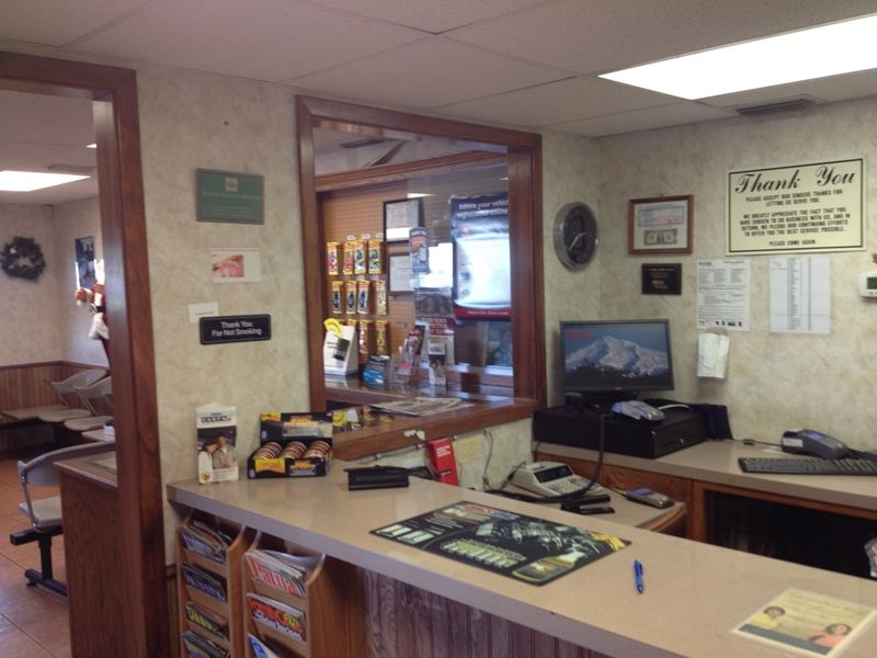 A reception area with a sign that says thank you