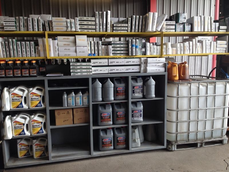 A store filled with lots of bottles including one that says ' ford ' on it