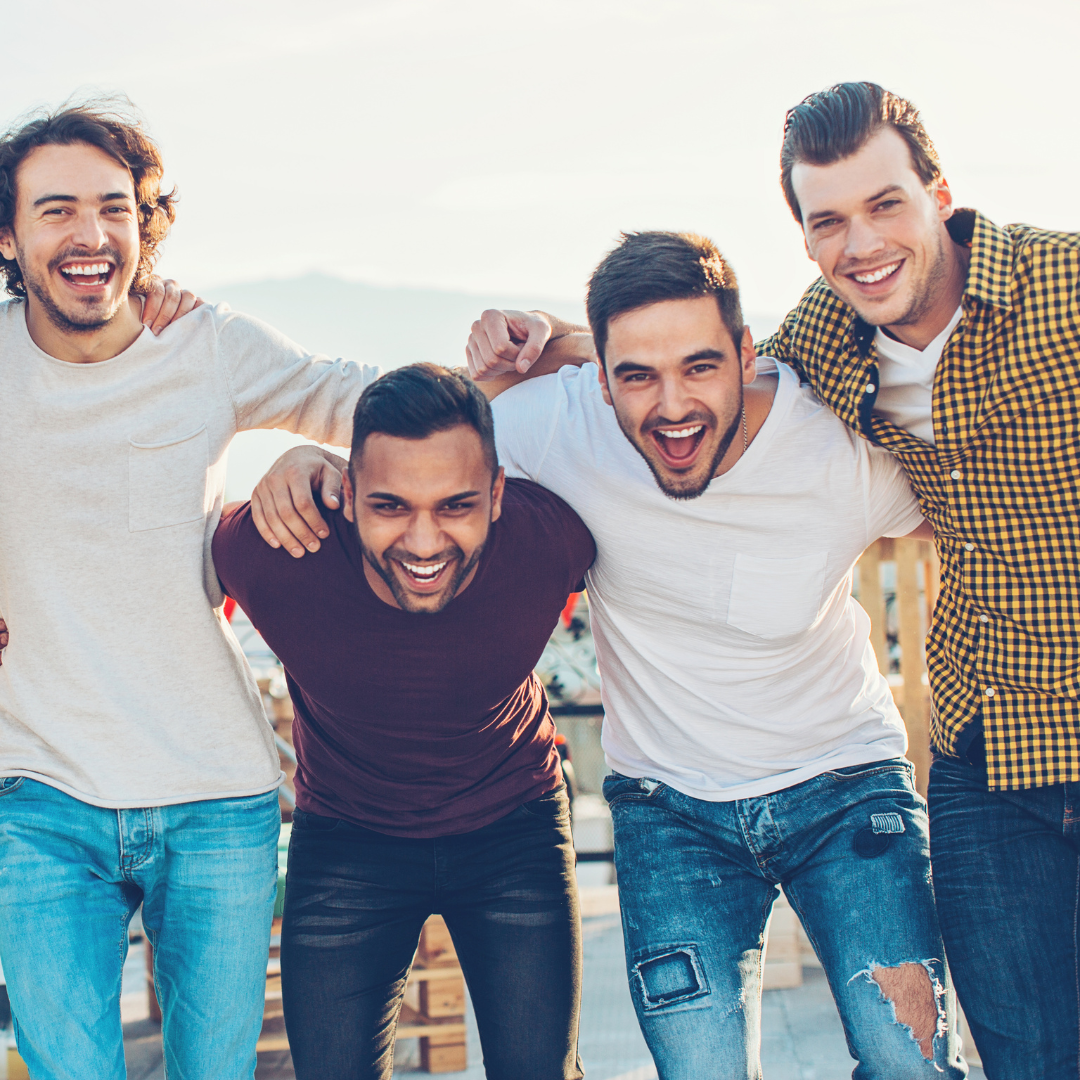 A group of young men are posing for a picture together