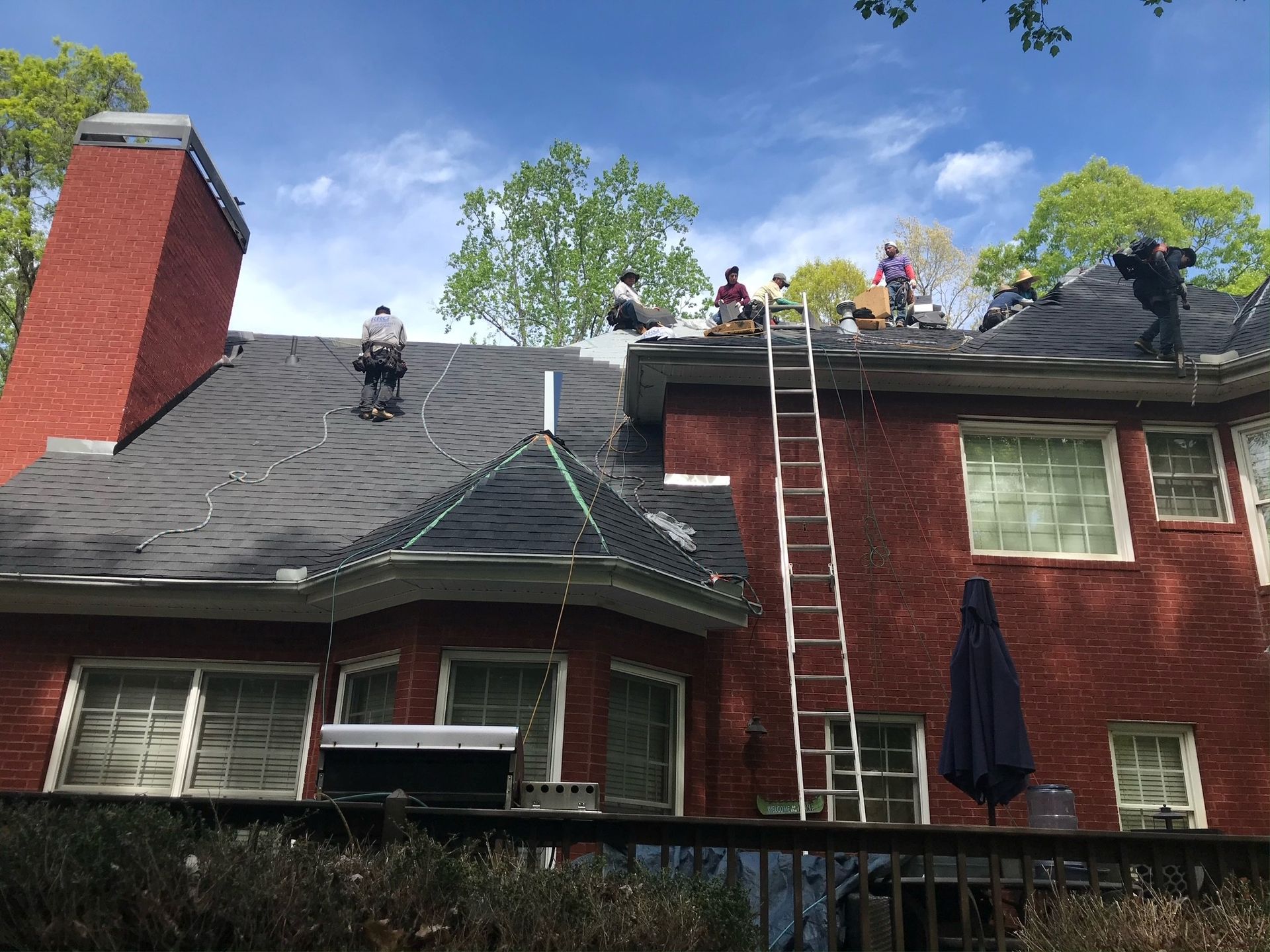 Roofing team working on a roof