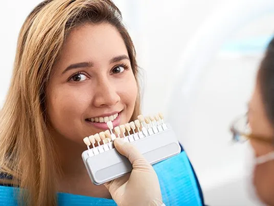 Young Woman Visiting Doctor for Teeth Whitening — McAllen, TX — Dr. Joey Cazares & Associates