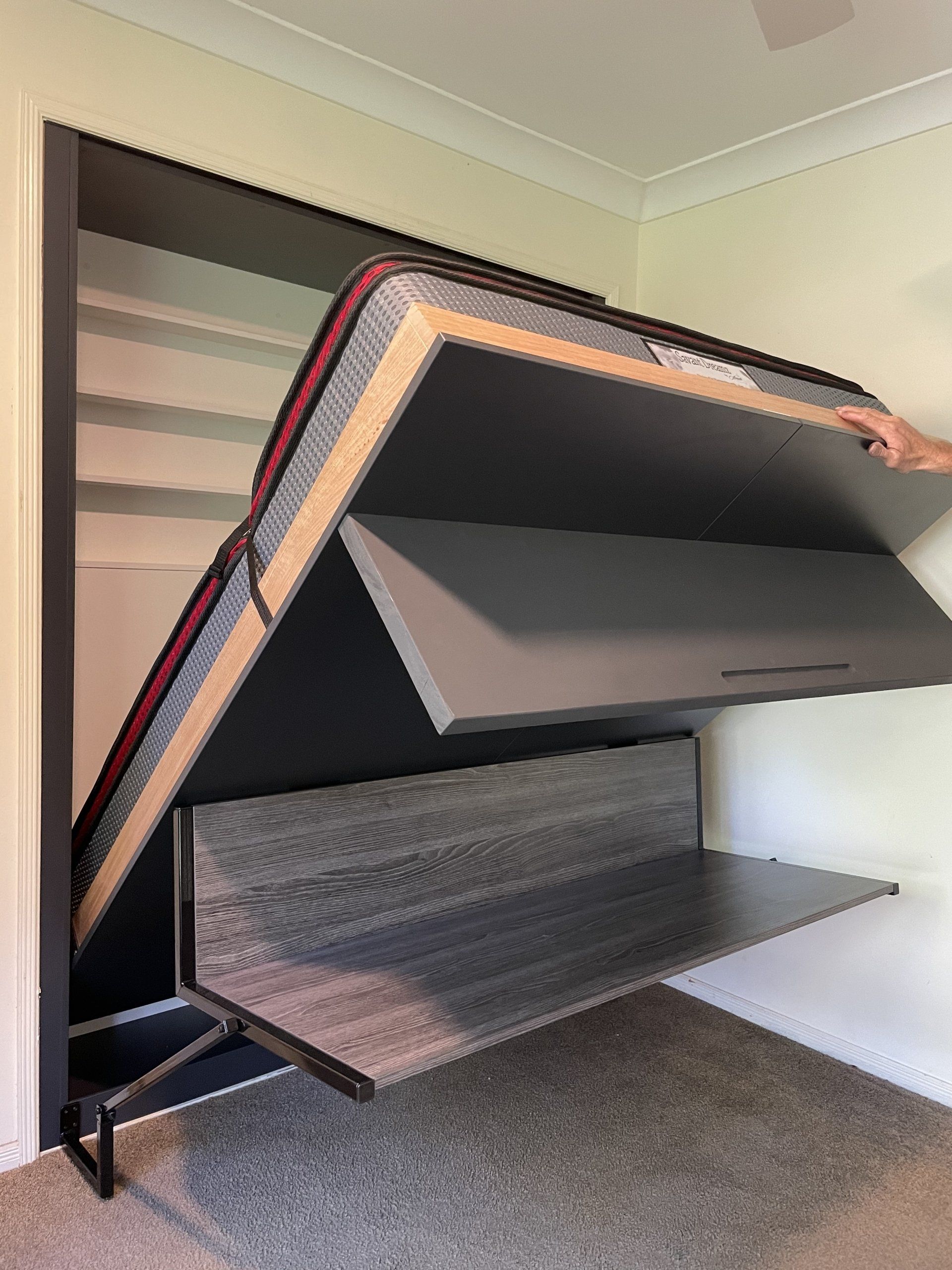 Custom wall bed in niche with desk and solid shelf BED SPACE DESIGN
