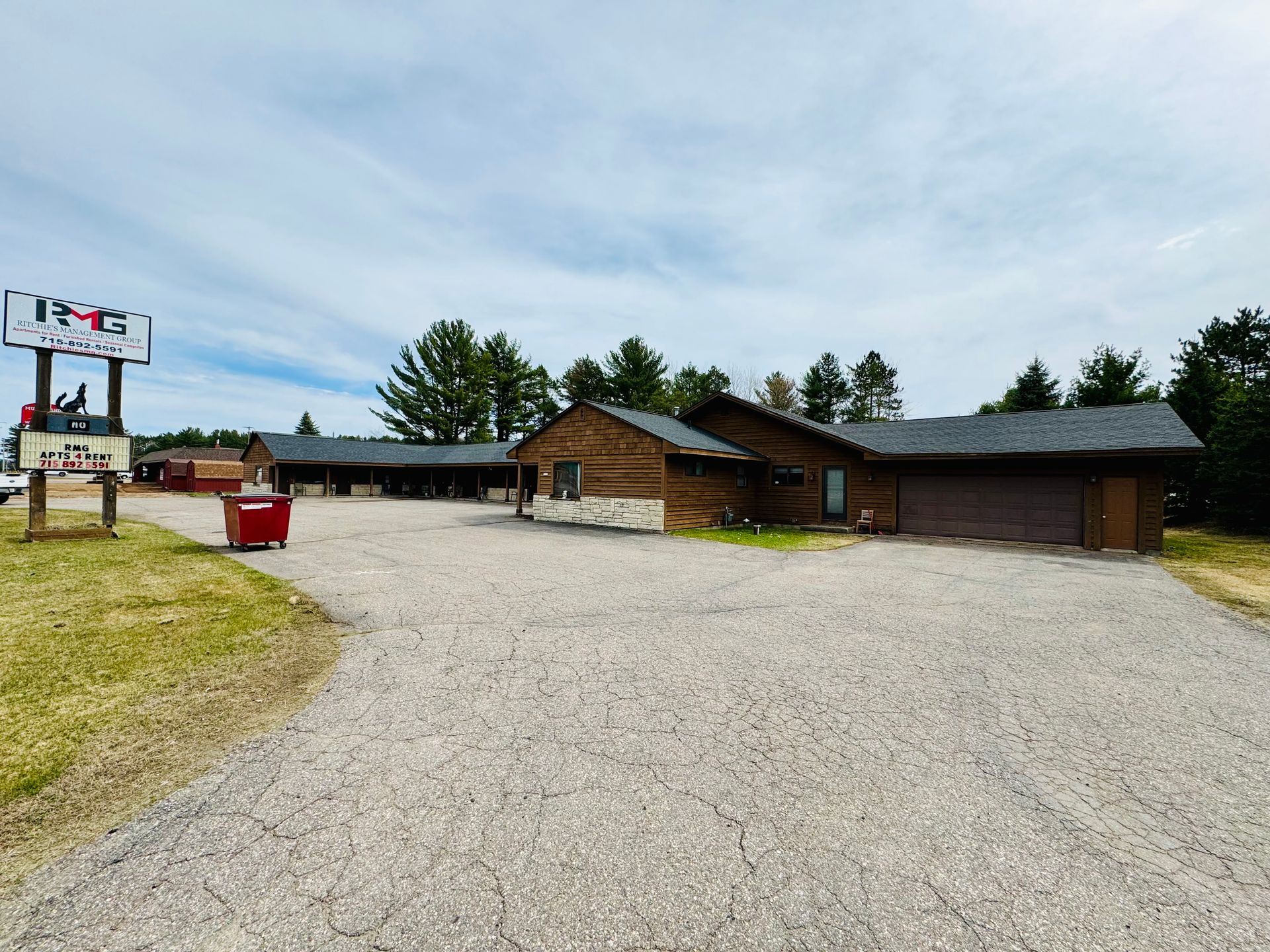 Welcome to Hwy 51 Apartments, a clean and well-maintained property located at 7528 Highway 51 in Minocqua, WI. This versatile community features 10 efficiency studio apartments and one spacious attached three-bedroom home with a private garage. Each studio is designed for simplicity, featuring a kitchenette and full bathroom, while the attached house provides a larger residential feel. Offering the ultimate flexibility with month-to-month leasing and the convenience of having all utilities and internet included in the rent, Hwy 51 Apartments is an ideal choice for those seeking a straightforward and accessible living experience in the Heart of the Northwoods.