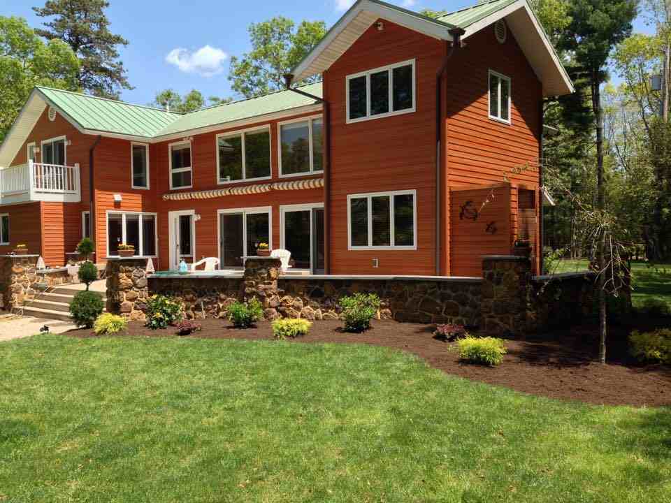 Two story orange house — Landscape Construction in Egg Harbor Township, NJ
