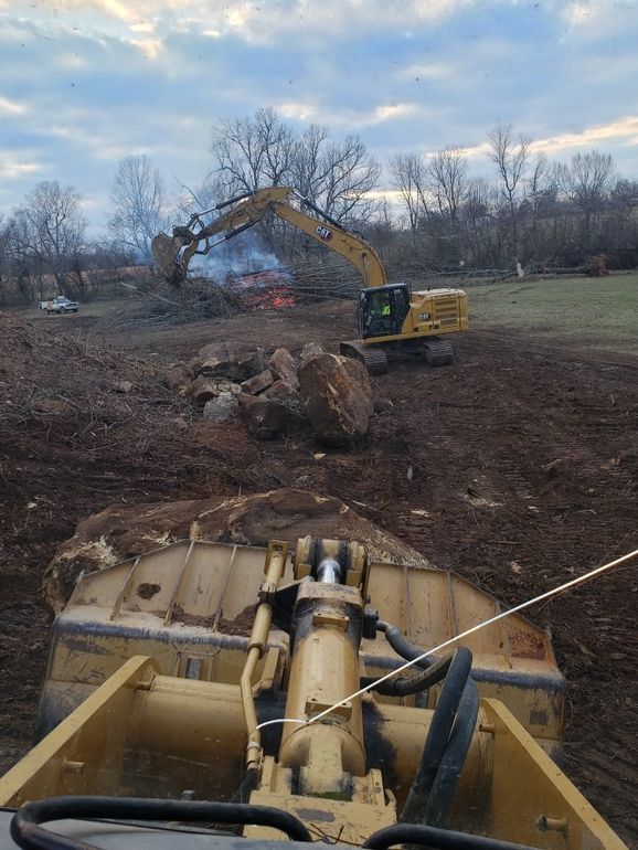 Excavator and Bulldozer Clearing Forest Land — West Plains, MO — Smith Excavating