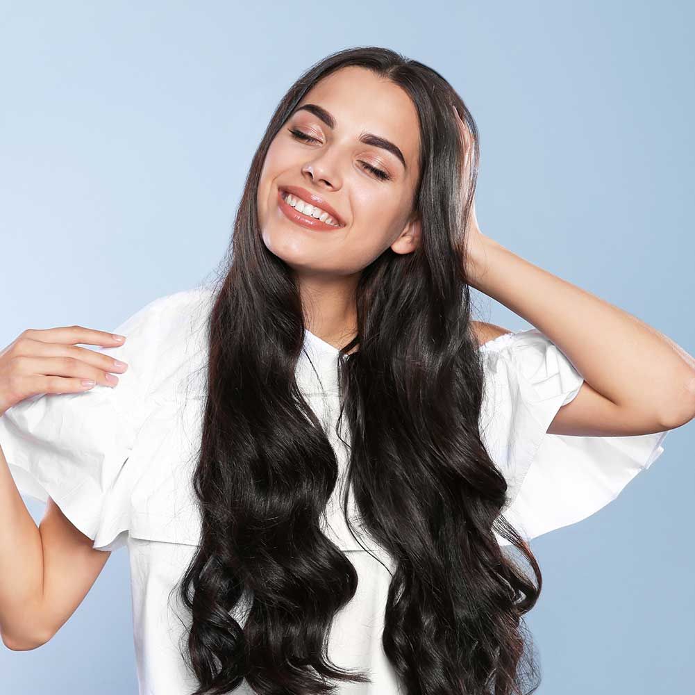 Portrait of beautiful model with gorgeous curly hair