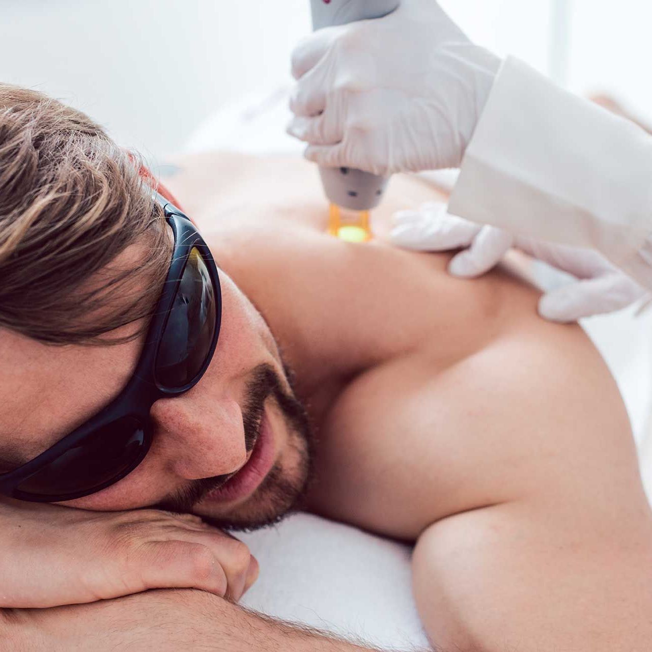 Man in a hair removal studio