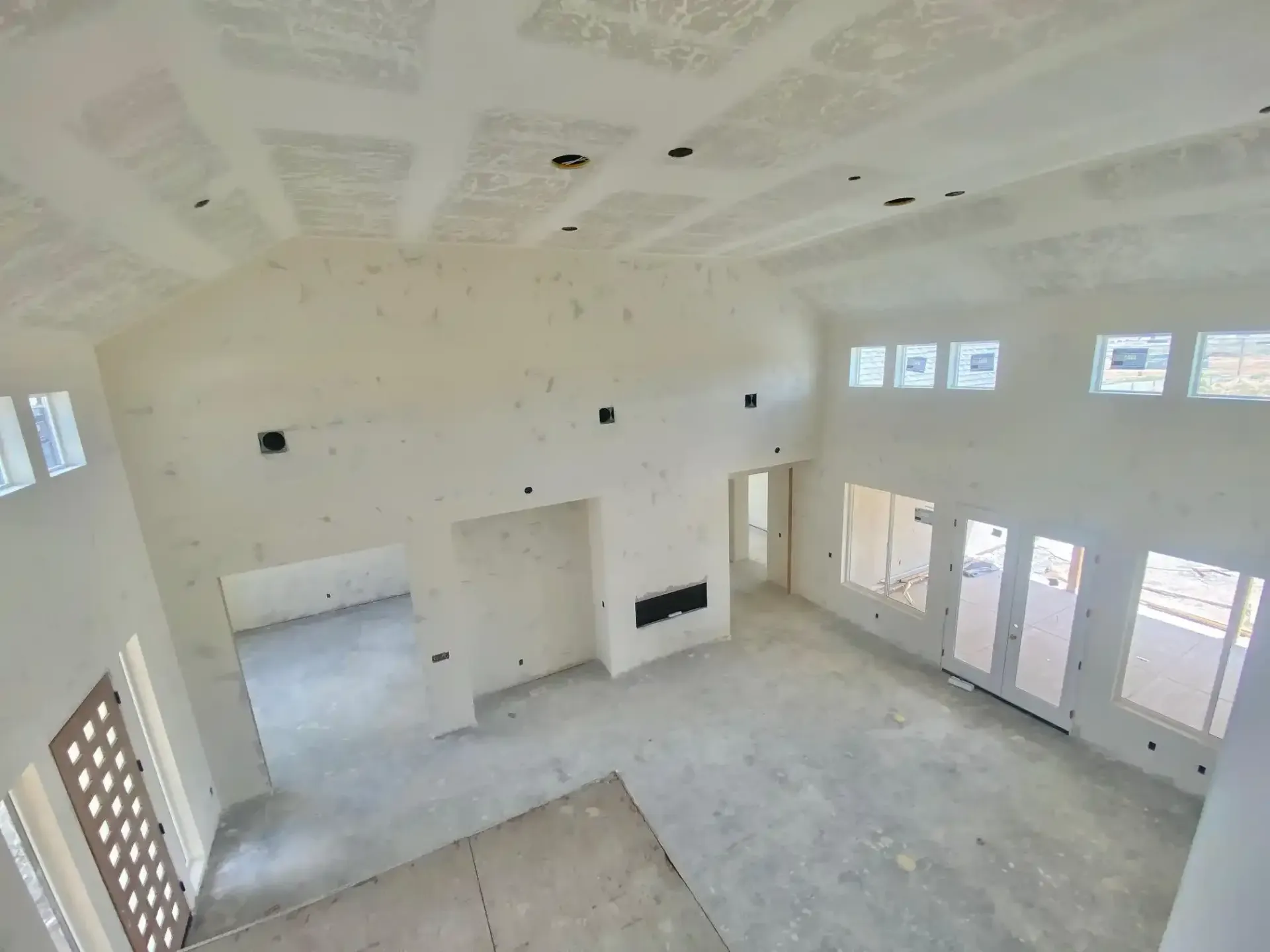 The living room of the Ruby, a custom home in milford utah, under construction